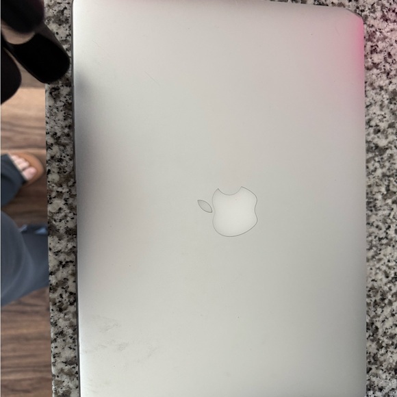 Apple MacBook Air in Sleek Silver - Picture 1 of 4